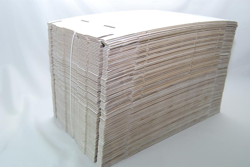 Caja automontable 340x247x32 a 2 bcos.-pq.100 un