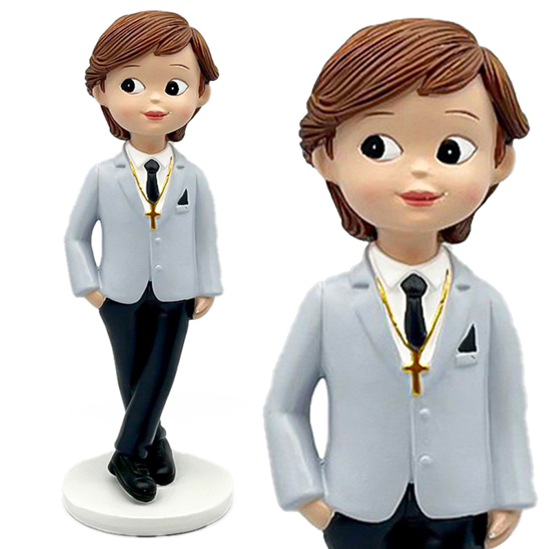 Niño comunion piernas cruzadas poliresina 16 cm.