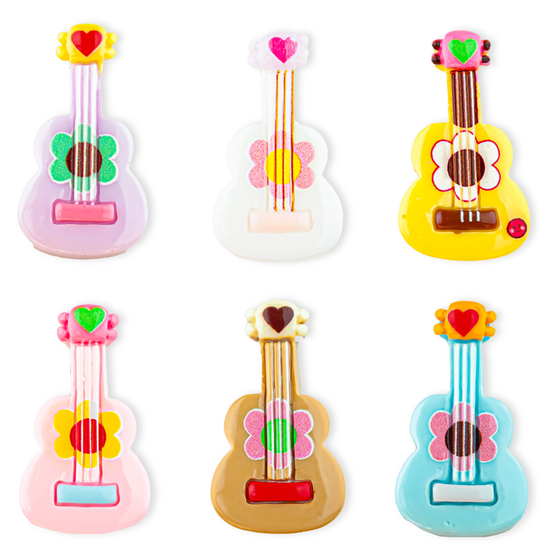 R. guitarras surtidas. 3 1x1 2 cm - caja 100 uds